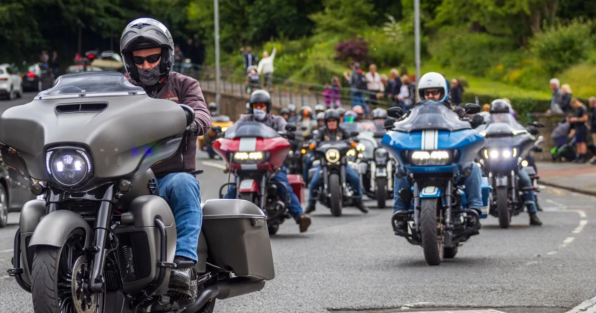 Motorcycles lined up on a UK road showing different engine sizes and tax bands